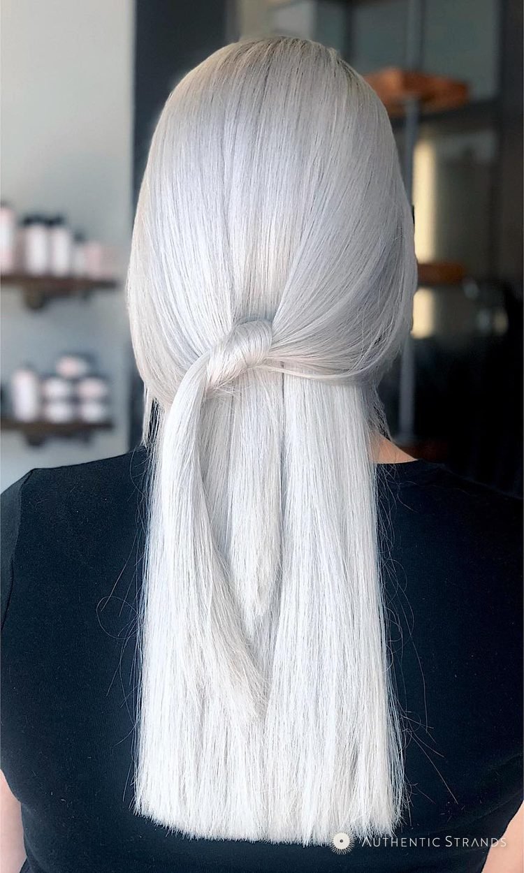 Back view of long, sleek platinum blonde hair